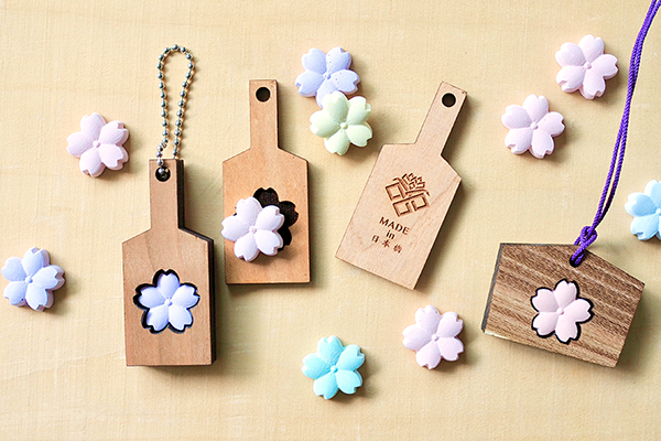 SAKURA-SHAPED AROMA STONE KEY CHAIN